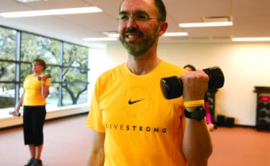 LiveStrong at the YMCA Participant lifting a dumbbell